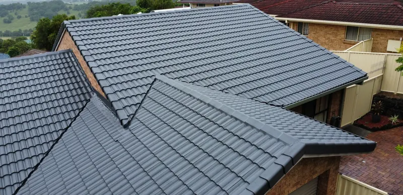 Restored tiled roof with fresh coating in Lismore