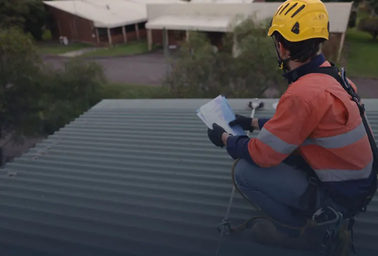 Roof restoration preparation and repairs underway