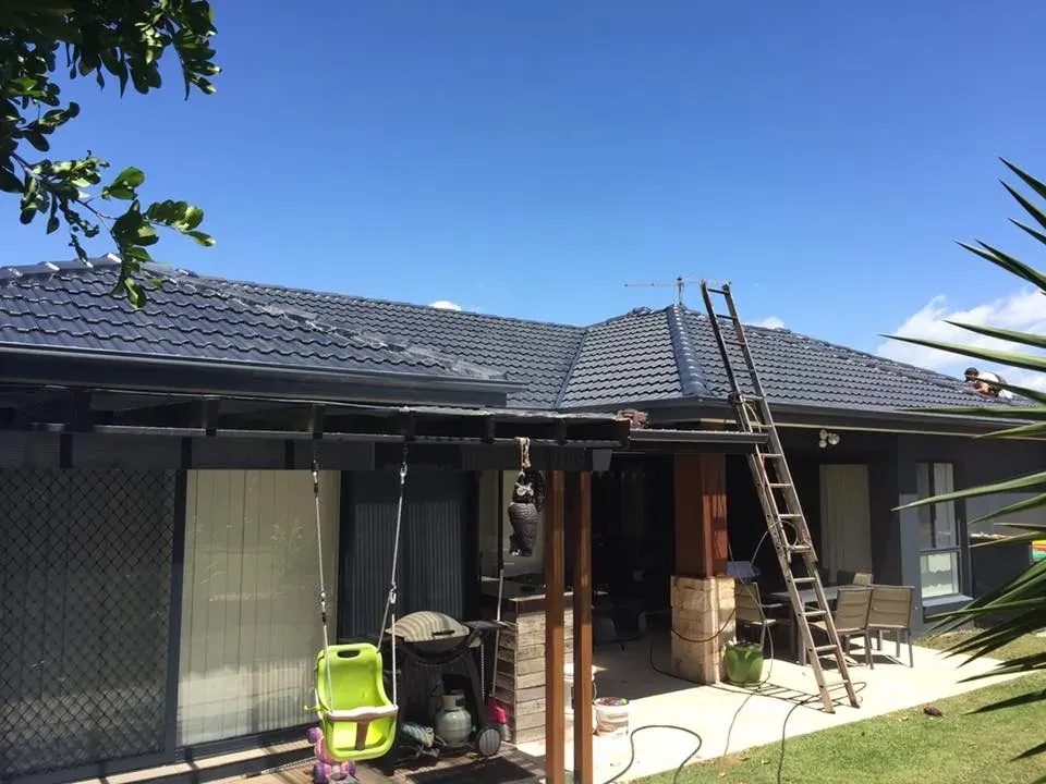 Completed roof restoration showing a fresh protective coating